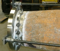 Column pipe with new flange being fitted